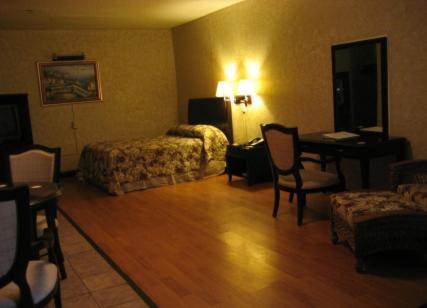 The Garden Villas Hotel Валдоста Стая снимка
